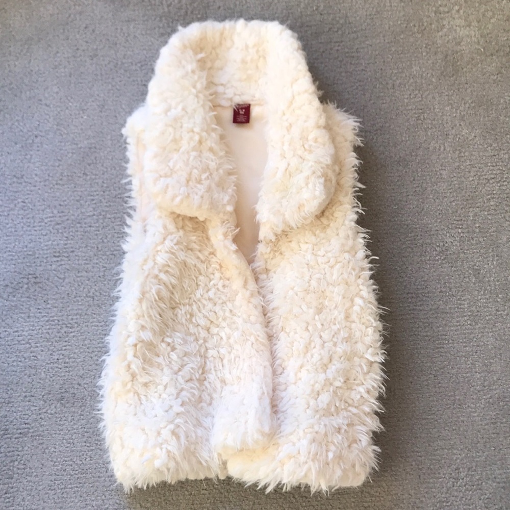 White faux fur vest
